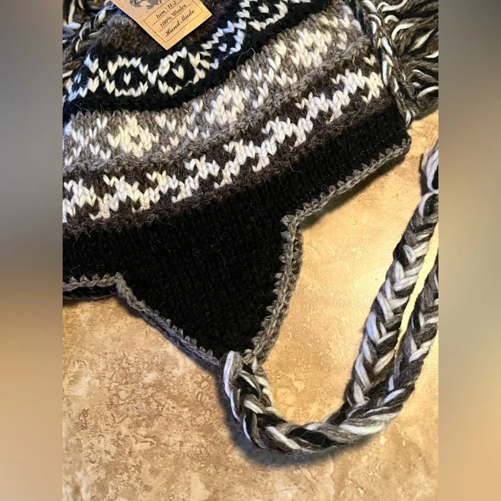 Pure wool knit hat. Mohawk helmet style. Handmade in Nepal. Grey black white NWT